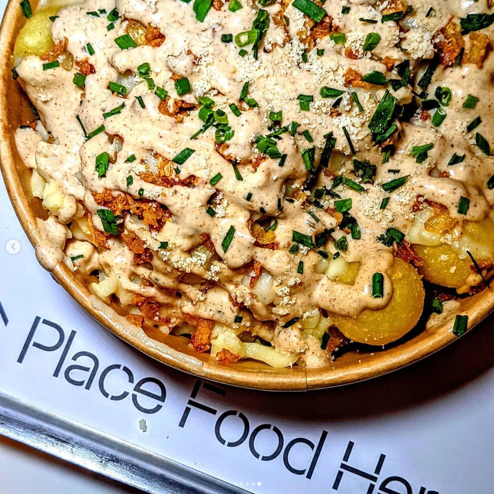 Fries with creamy sauce and herbs