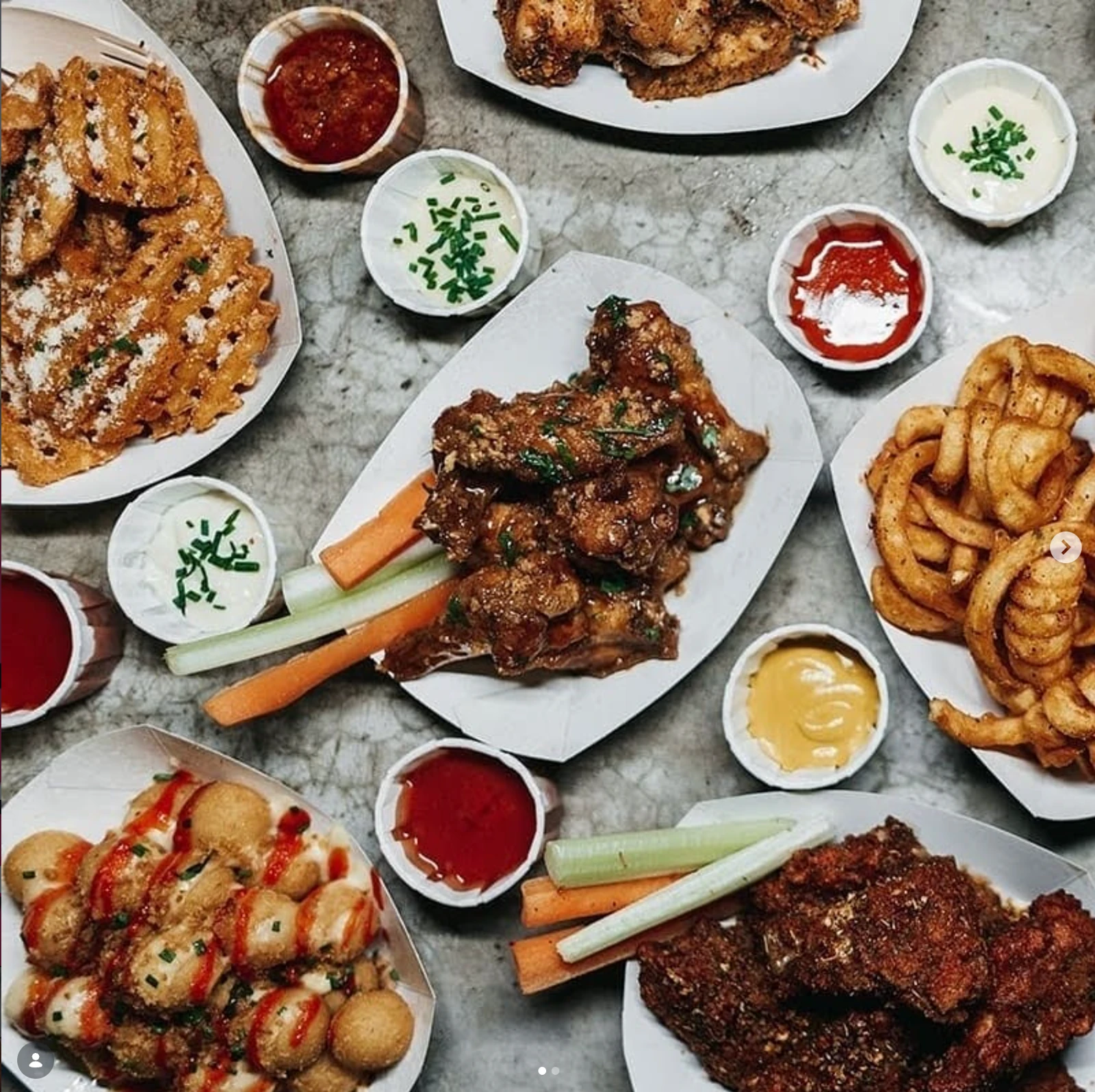 Wings and sides spread across the table