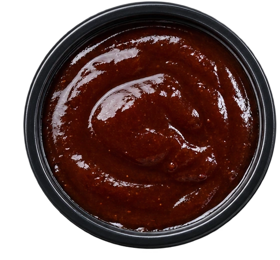 Bird’s-eye view of BBQ sauce in a dipping pot