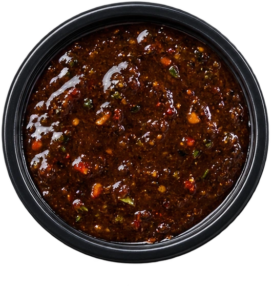 Bird’s-eye view of JERK sauce in a dipping pot
